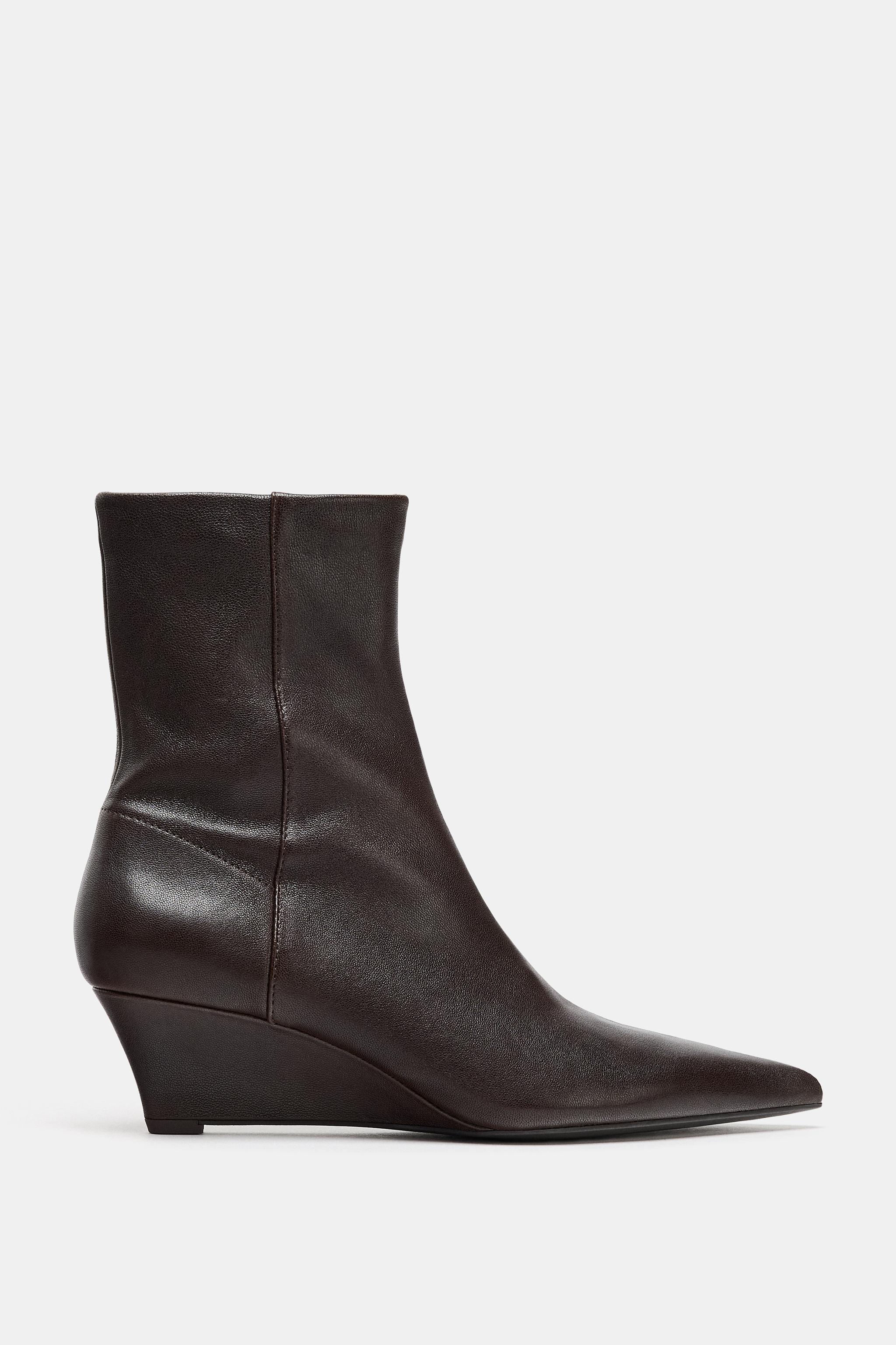 BOTTINES EN CUIR À TALONS COMPENSÉS